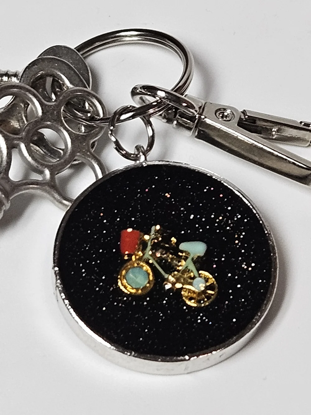 Gold Bicycle Pendant Keychain with Black Glitter Dial